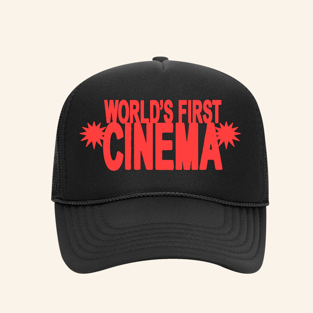 Merchnow Merch World's First Cinema Stacked Logo Black Trucker Hat Gifts For Brother