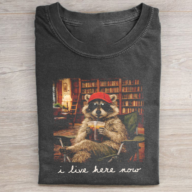 Raccoon Relaxing In Library T-Shirt Bookshelf Reading Drink Gifts For Animal Lovers
