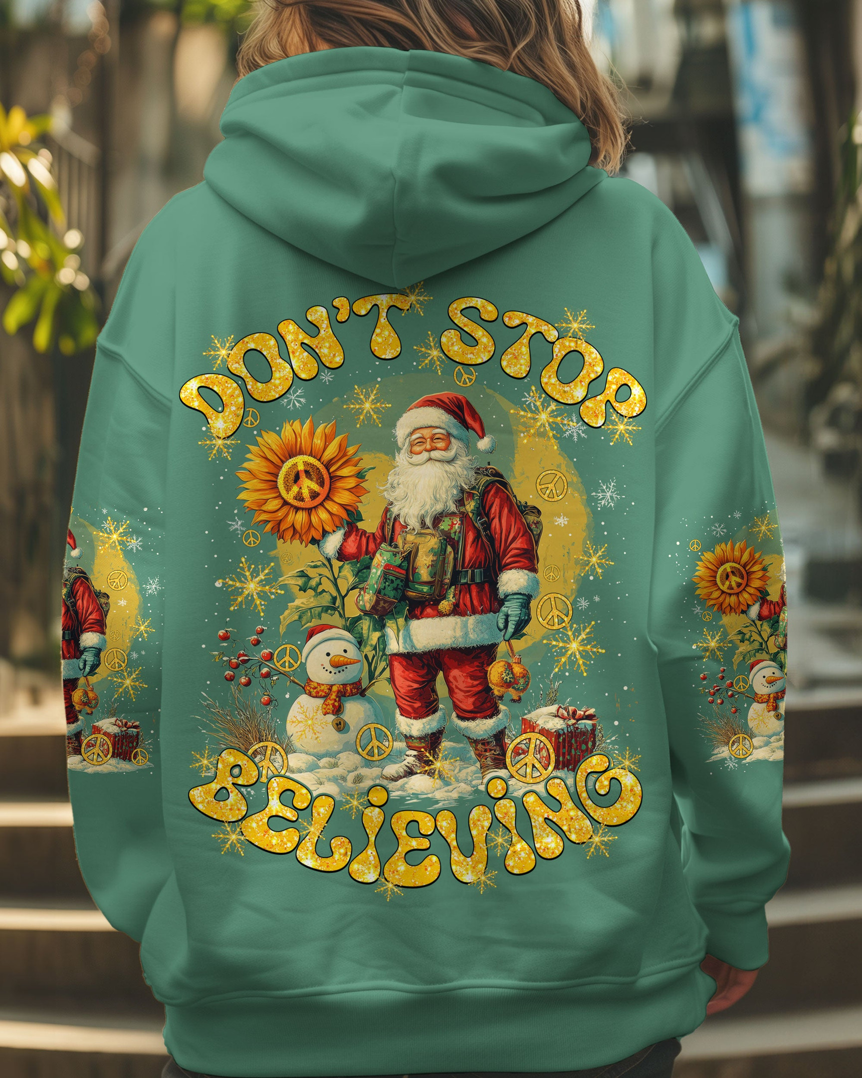 Santa And Snowman Hoodie Don't Stop Believing Sunflower Cute Merchandise Gifts For Winter