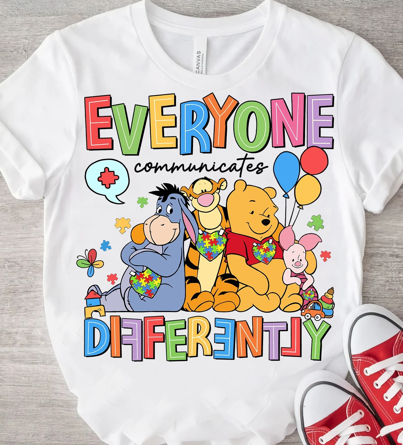 Winnie Autism Awareness Month T-Shirt Everyone Communicates Different Cute Cartoon Shirt
